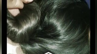 Touching & trying to open this Indian silky hairbun